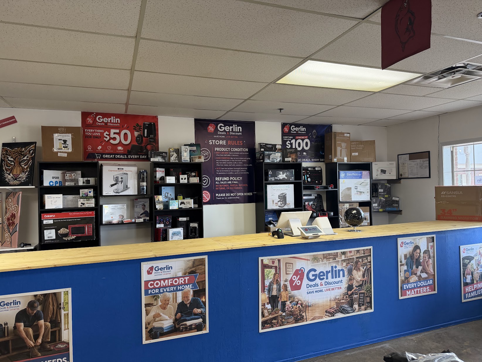 Fresh overstock merchandise being unpacked into bins at Gerlin Deals & Discounts in Fayetteville AR
